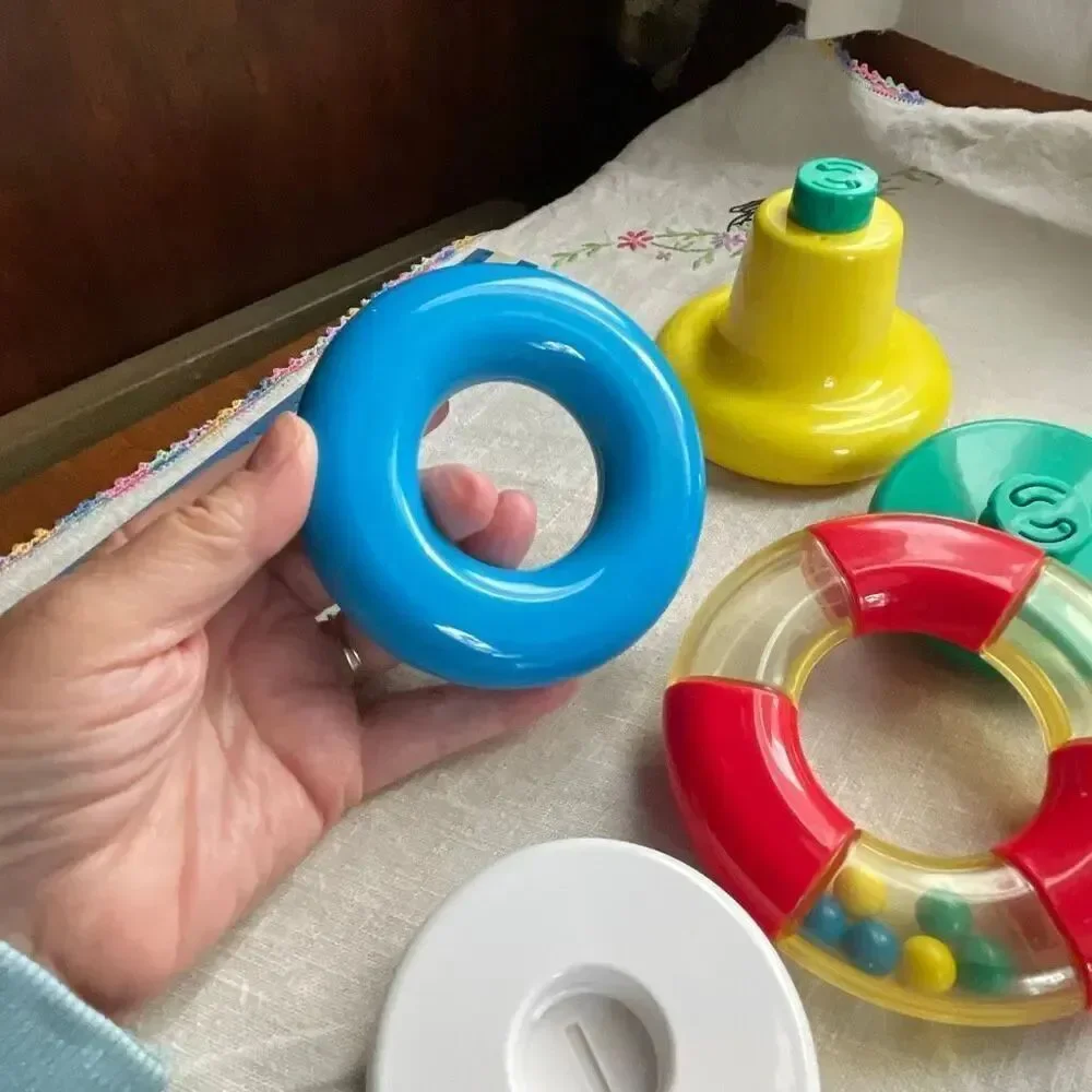 1996, Ring ‘n Roll Gerber Products Co. Toy Biz, Inc roundish rolling rattle infa